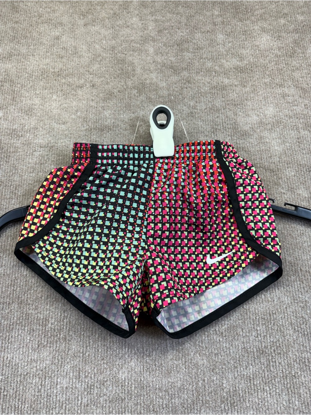 Nike Little Girls' Dri-FIT Pixel shorts featuring a vibrant geometric pixel patt